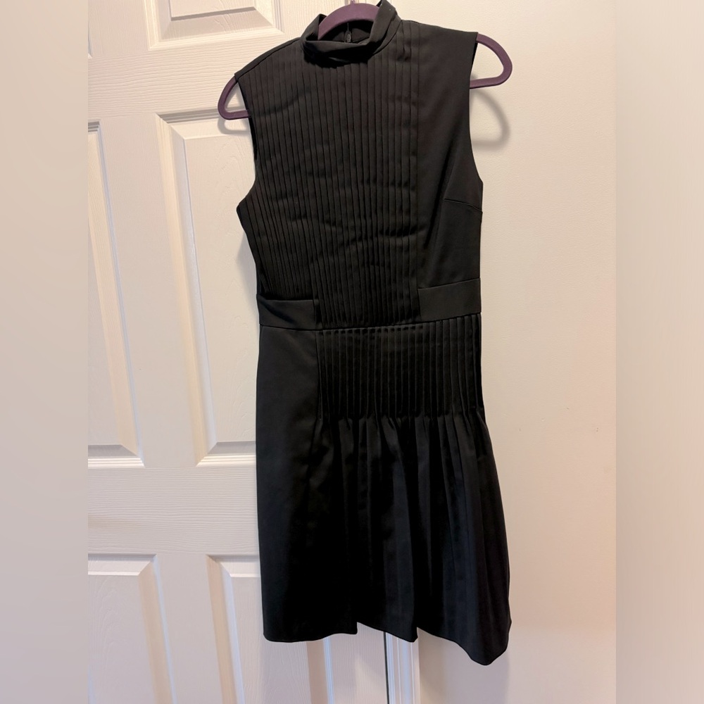 NWOT little black dress size 10 with pleated design hard to show on pic